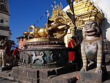 Kathmandu Swayambhunath 14 Two Snow Lions and a Giant Vajra On A Drum With Tibetan Calendar Animals Monkey, Bird, Dog, Pig At Entrance To Swayambhunath Stupa 